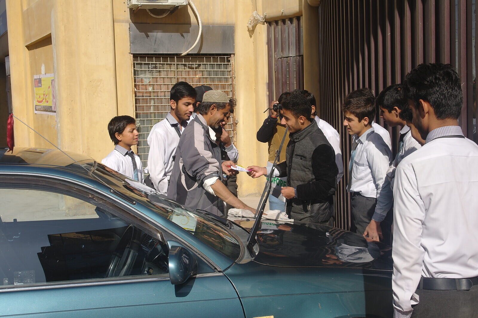 Community members interact on a city street